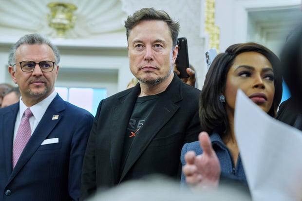 Elon Musk looks on as President Donald Trump meets South African President Cyril Ramaphosa 